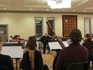 Robert Butts conducts the rehearsal